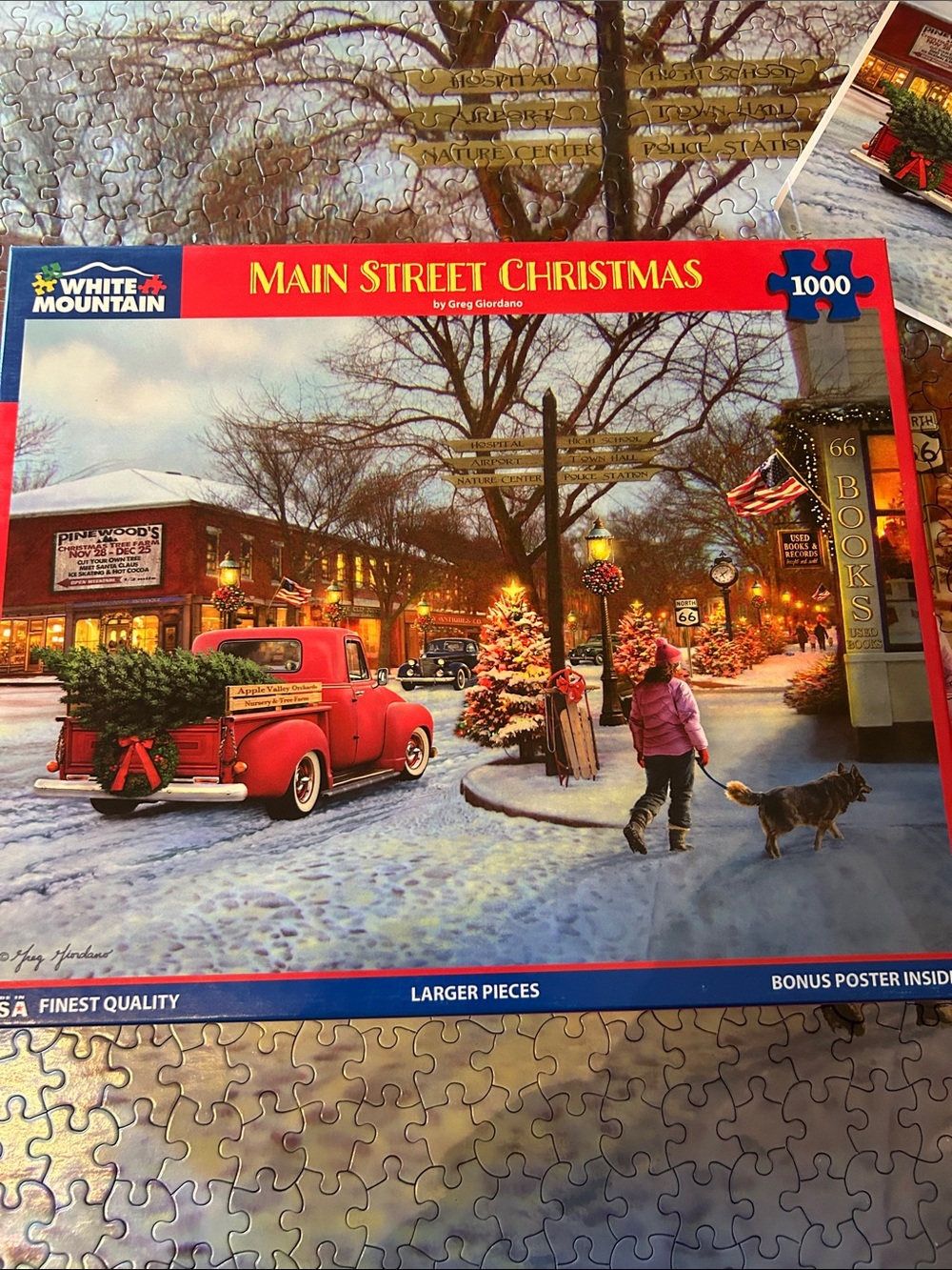 White Mountain Main Street Christmas Puzzle with Red Vintage Truck